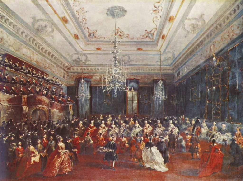 Upper-class citizens of Venice mill around a ballroom in a gala event for visiting Russian nobility, with men wearing dark colors and women wearing red and white dresses with poofy skirts. In a 3-tiered balcony on the upper left, the women's orchestra from the Ospedale della Pieta performs. The musicians all wear black gowns and caps.